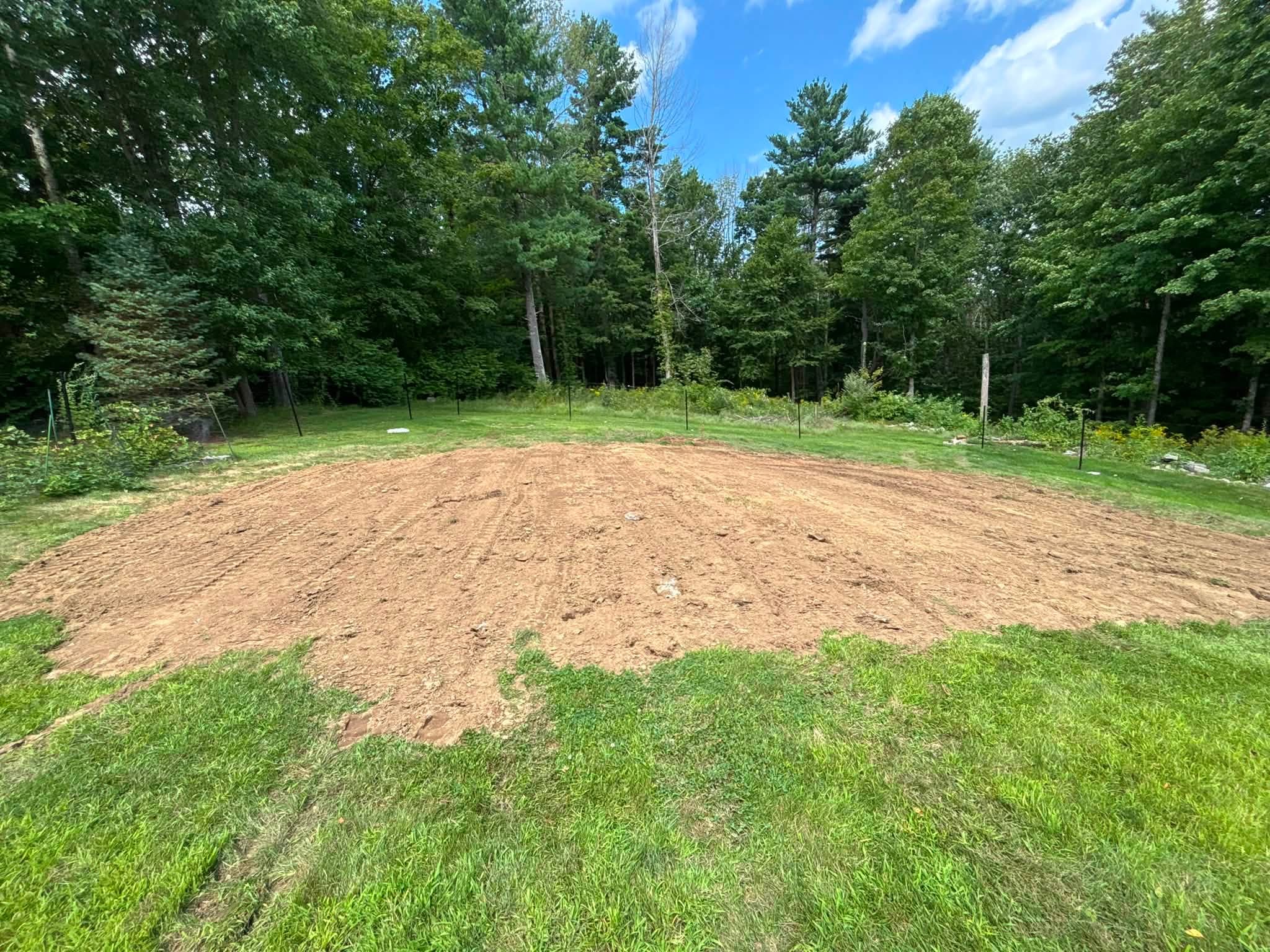 Finish graded and compacted — former pool area fully reclaimed